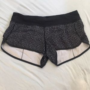 White writing Lululemon athletica shorts size 8